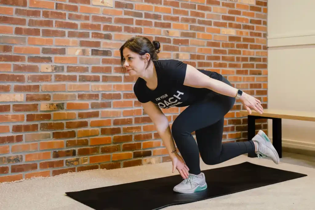 Tone Your Arms in Just One Week: Achieve Results Without the Gym! 1 A person exercising their arms at home with light weights Frimley