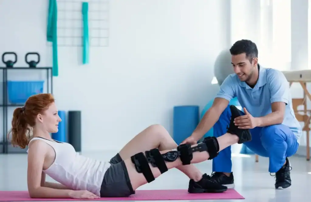 Debunking Meal Timing Myths: The Truth About Muscle Recovery 1 Woman having treatment to help muscle recovery Frimley after an injury